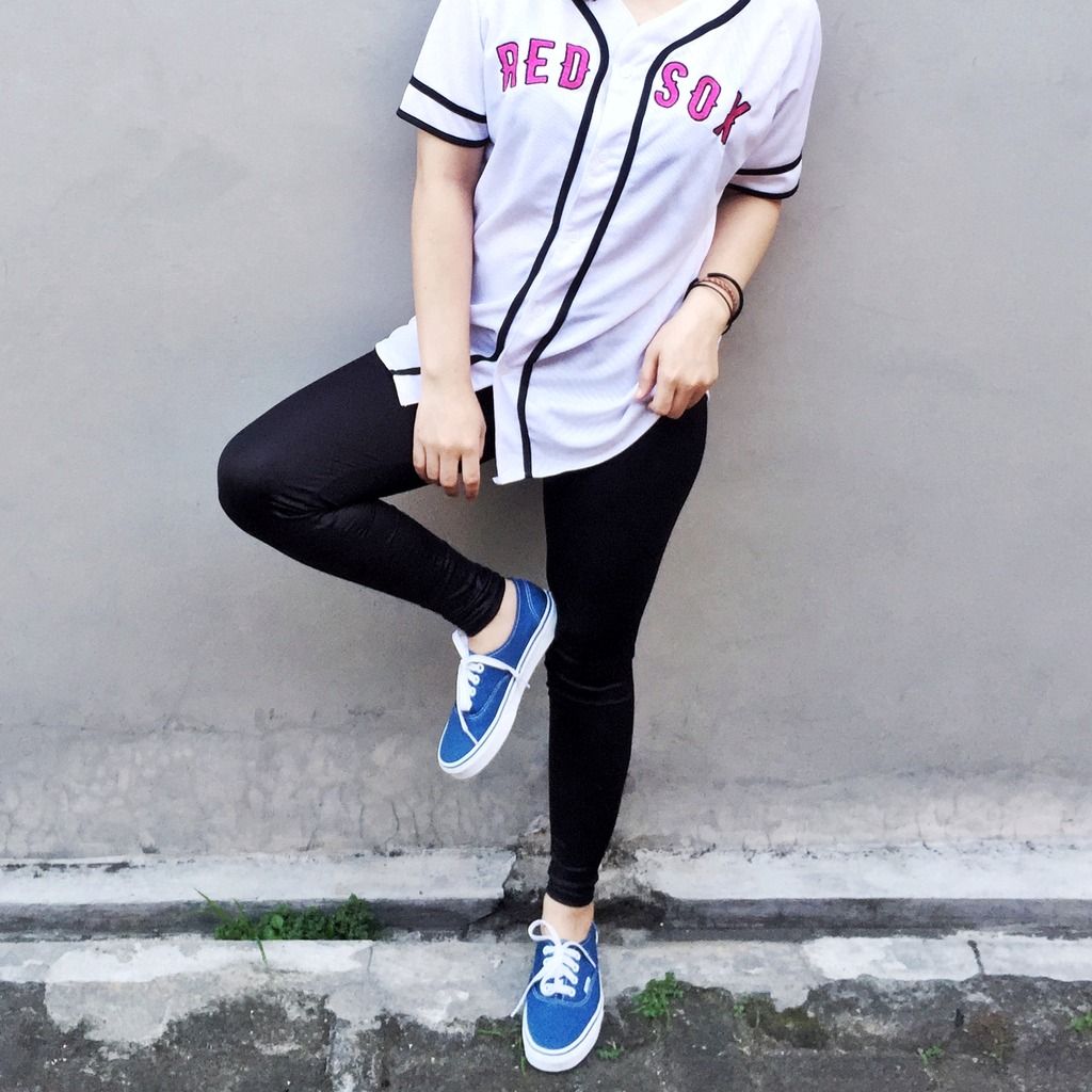 casual Vans with loose baseball jersey